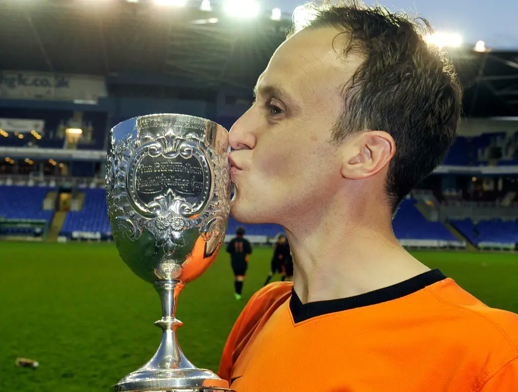 Wokingham & Emmbrook Captain Grant Lewin with the Reading Senior Cup in 2014. Photo: getreading.co.uk