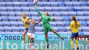 Grace Moloney makes a save for Reading Women against Brighton and Hove Albion. Photo: Neil Graham